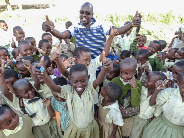 Kenya, Pastor Gilber with some of the kids.